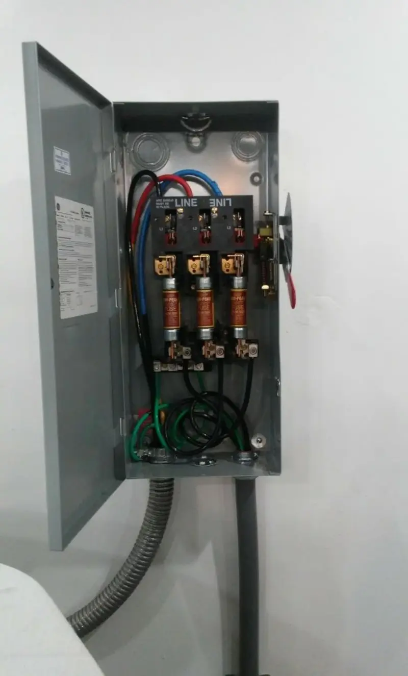 Three-phase disconnect switch installed for Smoke Detector Installation in Roswell